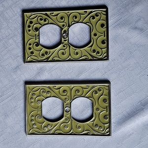 Silver and green outlet plates